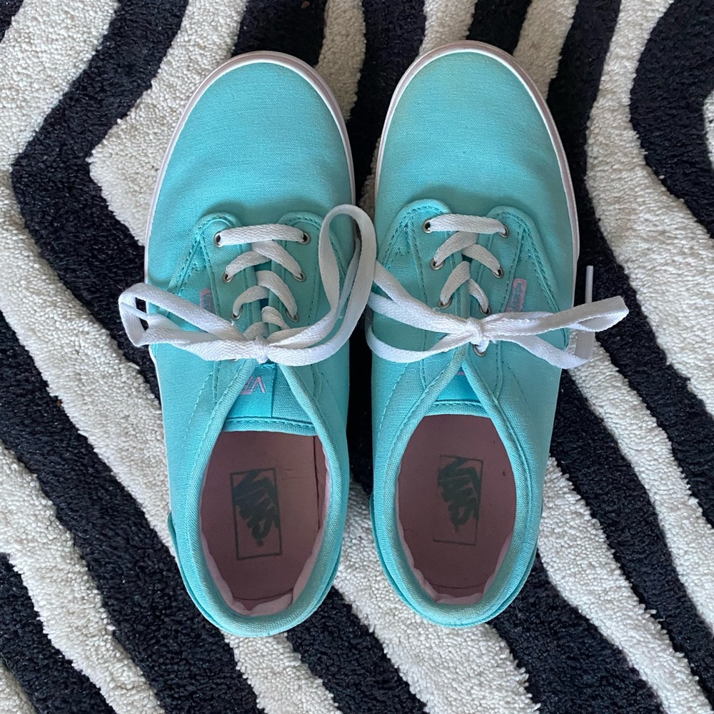 Teal with pink trim vans off the wall